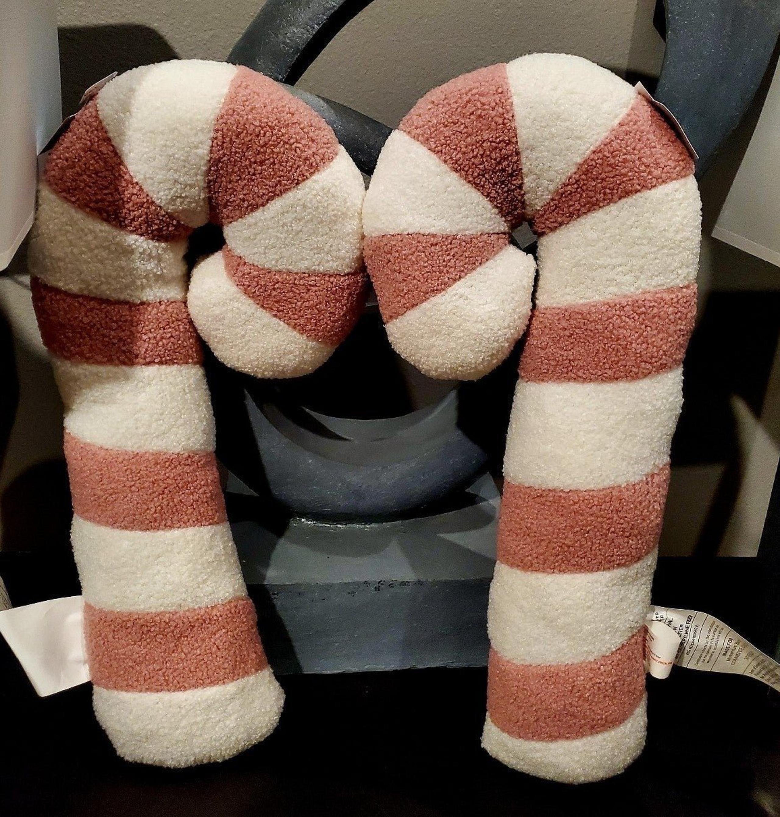 Two Pink Candy Cane Shaped Pillows