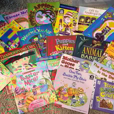 Kindergarten level ? Bunch of books in great used condition. Paperback/few hard
