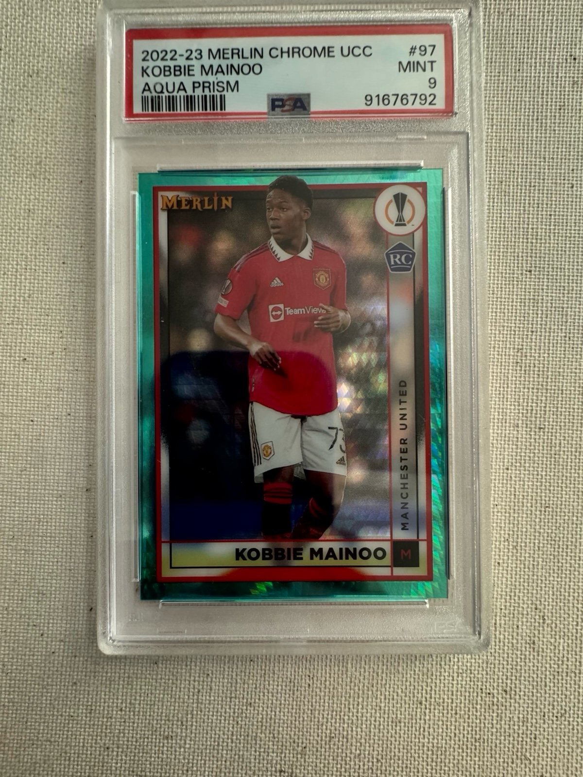 2022-23 Topps Merlin Chrome UCC Man United RC Kobbie Mainoo Aqua Prism Refractor
