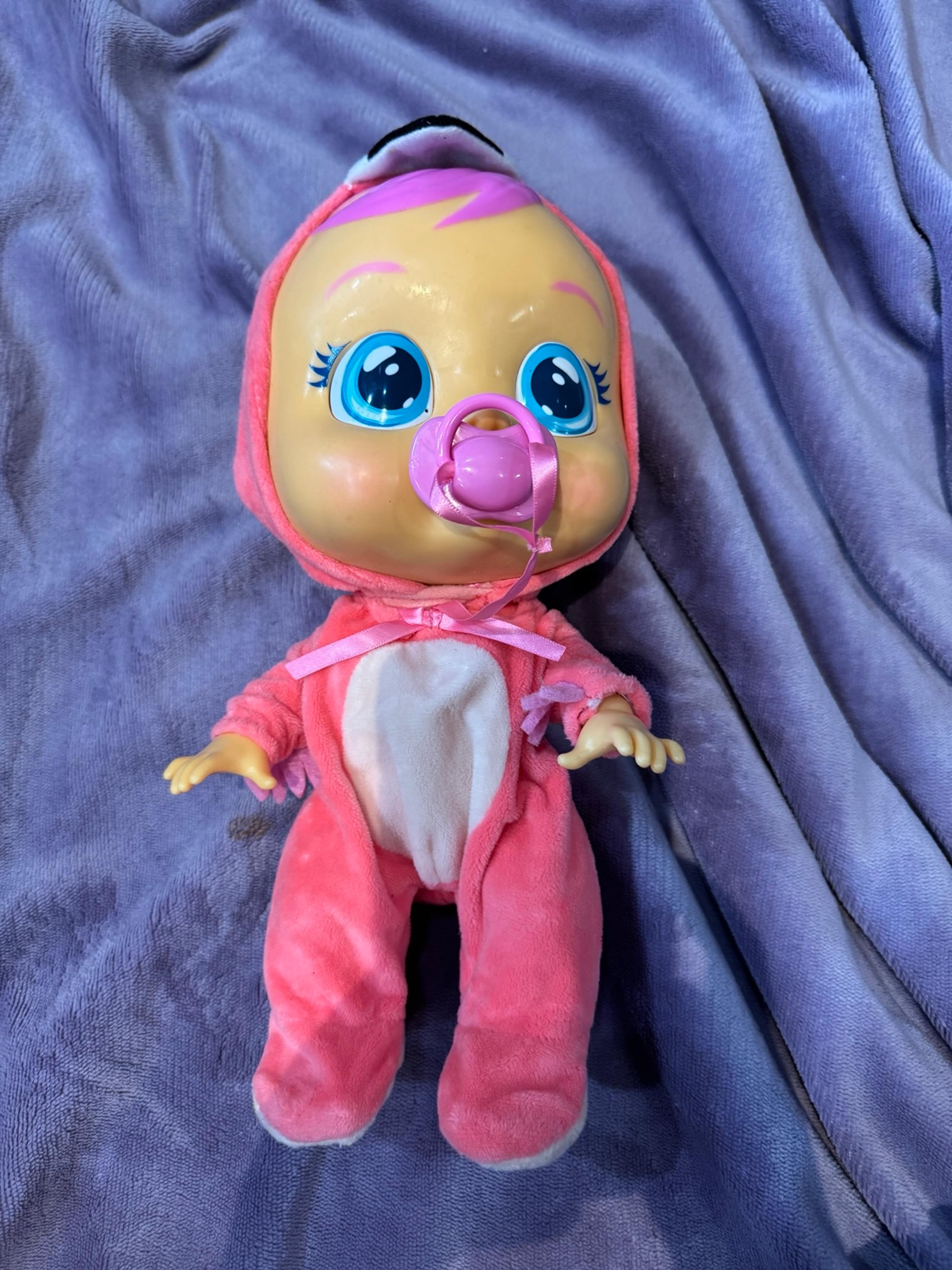 Cry baby doll with pacifier flamingo