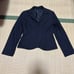 Navy tailored skirt and jacket set.