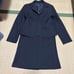Navy tailored skirt and jacket set.