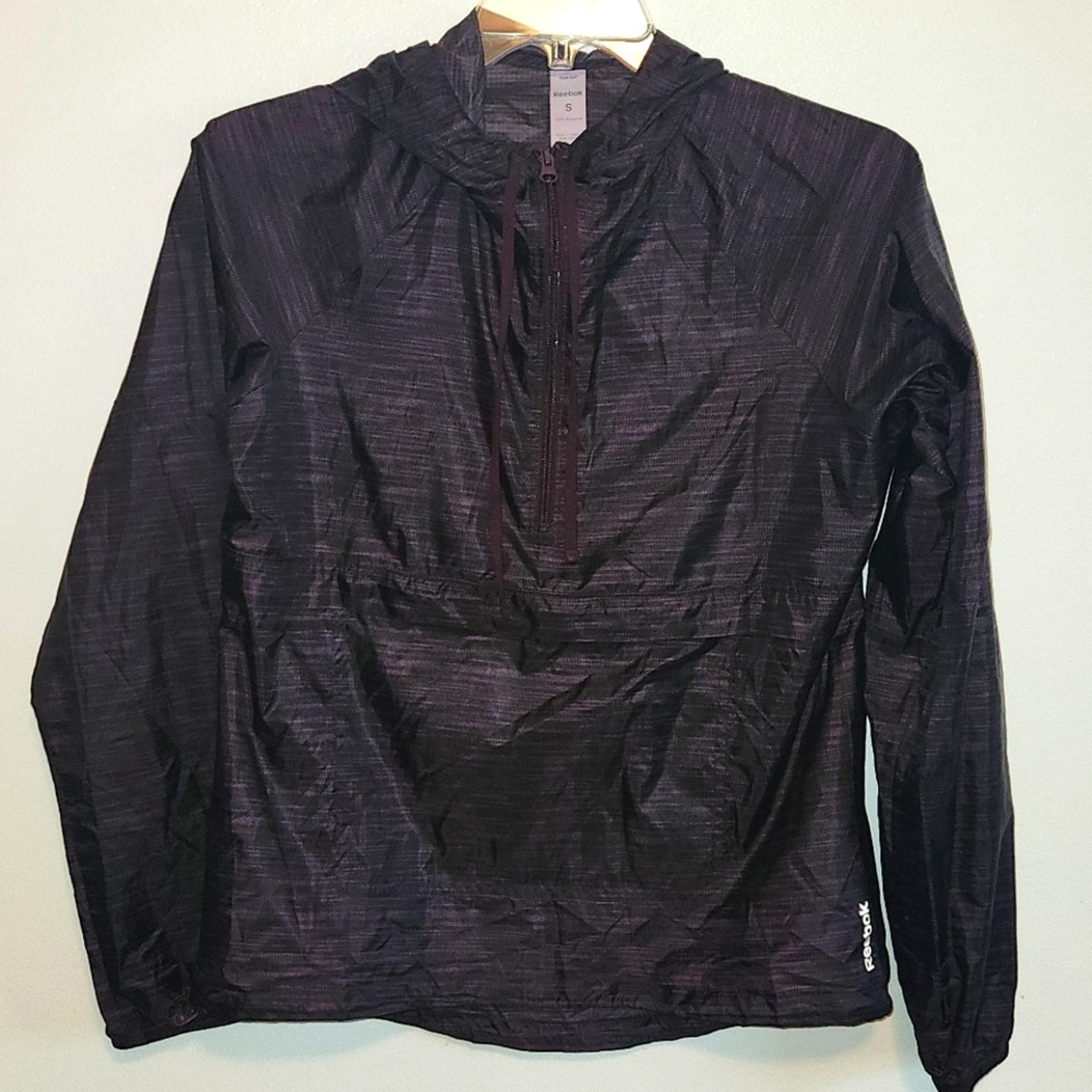 Reebok Women's Small Zip Pocket Hooded Windbreaker