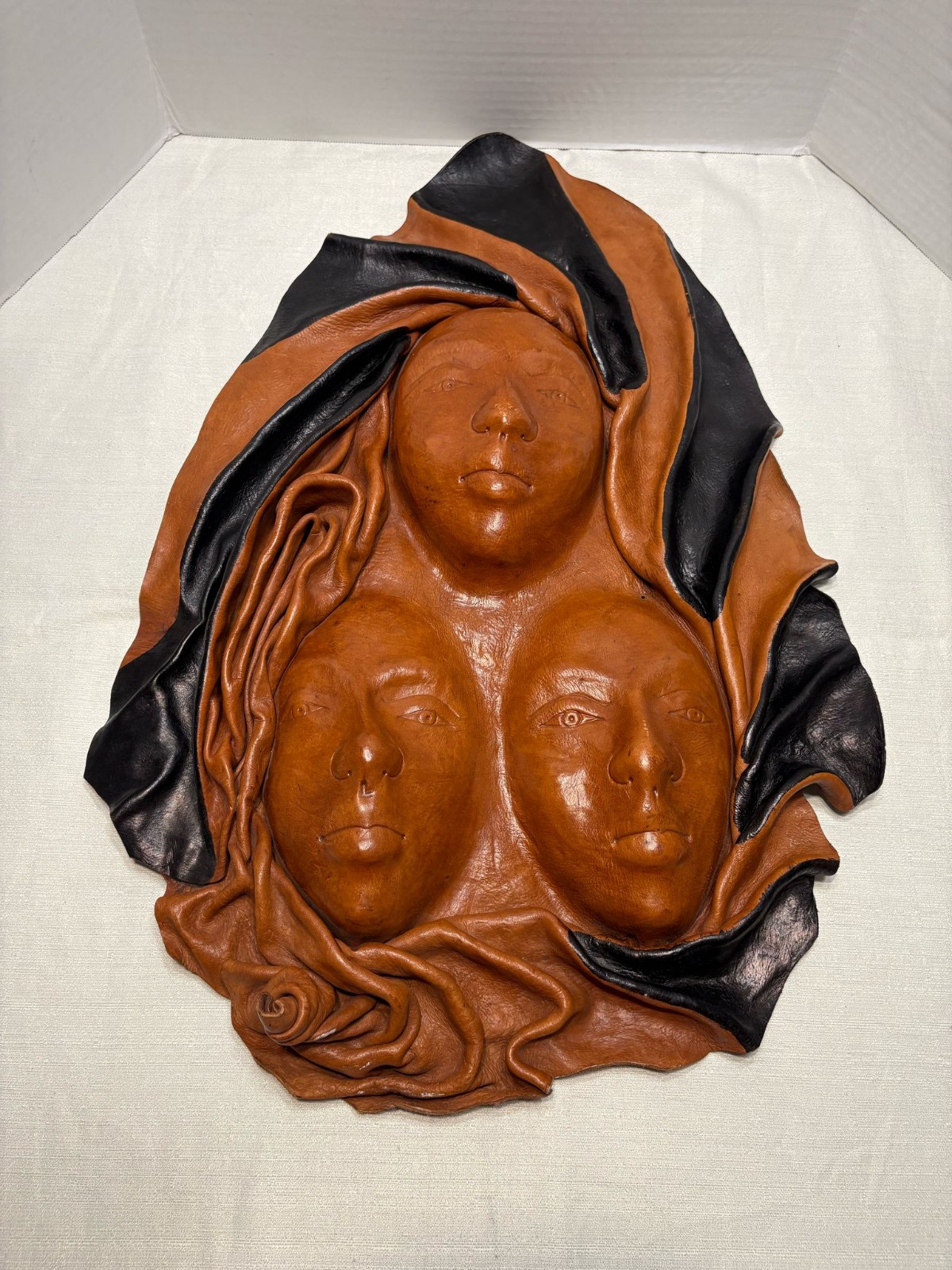 3 face mask leather sculpture