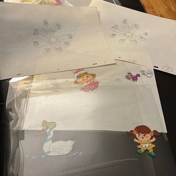 Lot of Seven CHARMKINS Original Animation Production Cel Artwork & Drawings.