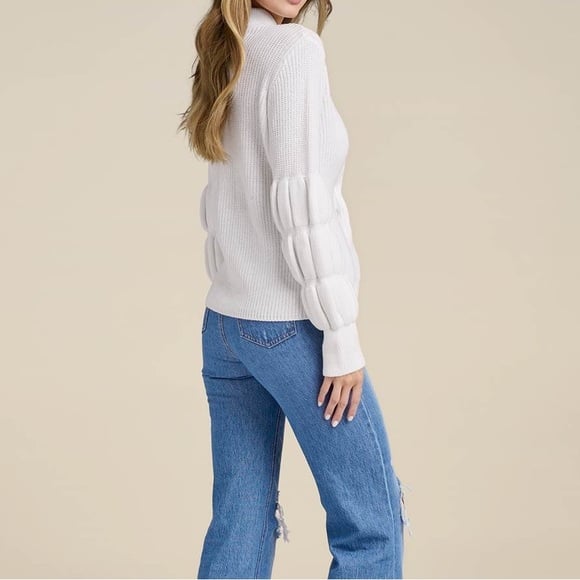 Beautiful puff sleeves sweater.sizes M and L brand New white