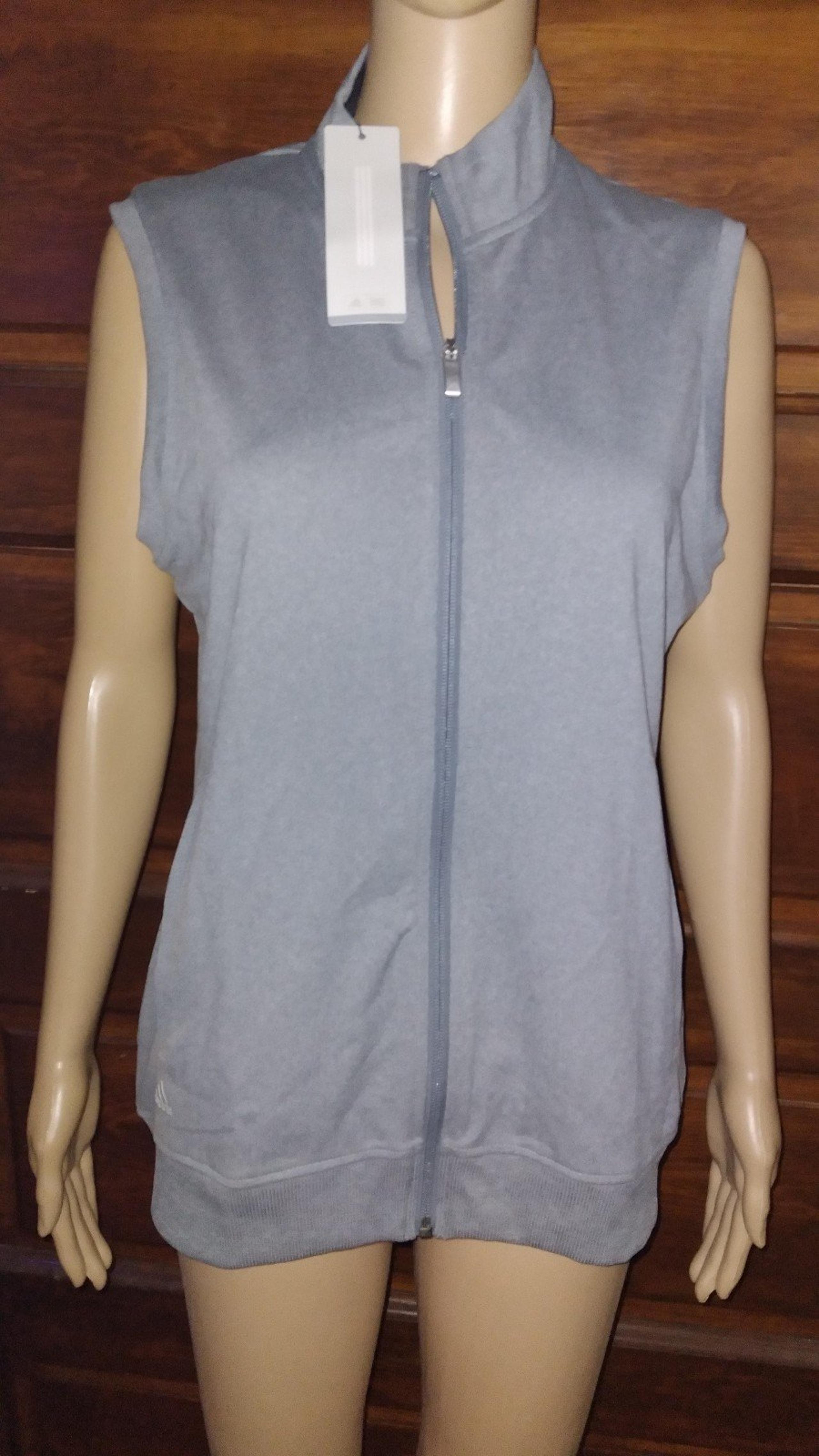 New with tags ADIDAS GOLF ladies MEDIUM full zip vest.