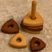Wooden stacking toy in triangle shape, l