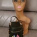 Rainbow studded black New York hat and p