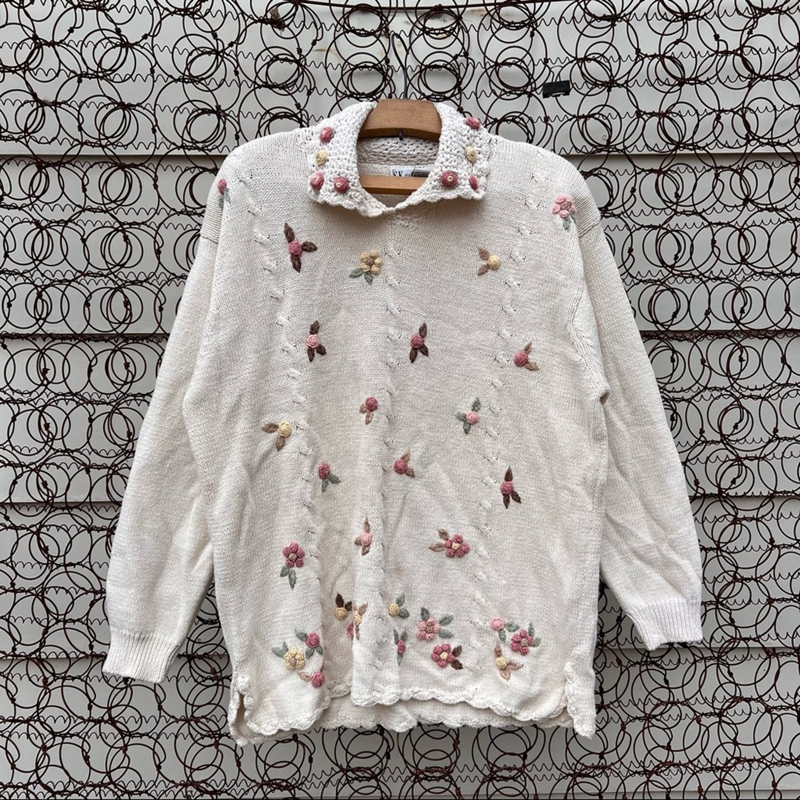 Vintage knit cream sweater with floral rosettes and crochet collar