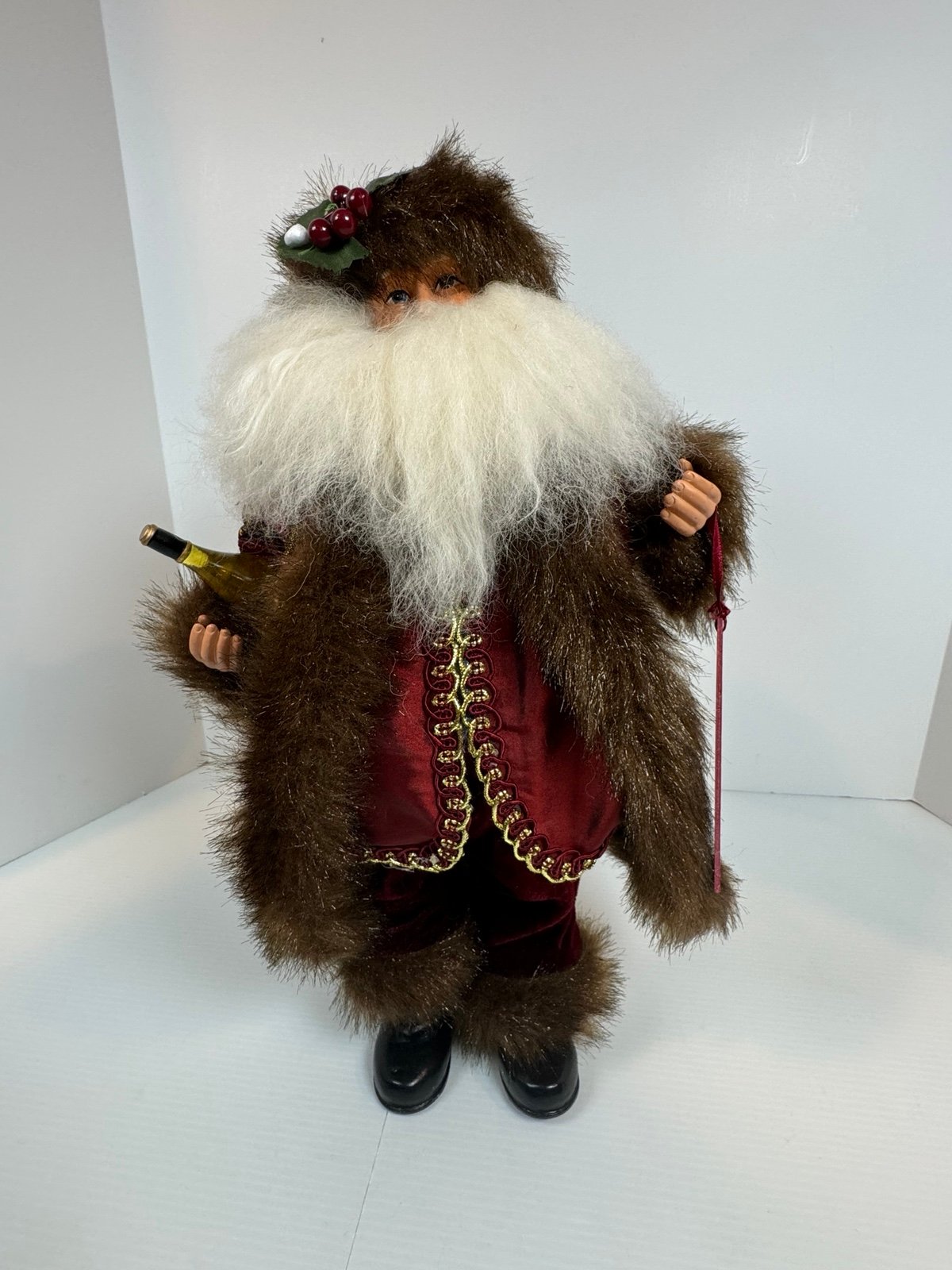 Christmas Santa Claus Holiday Decoration Stands 16” Tall Holding A Bottle of