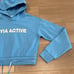 ZYIA ACTIVE Sky Blue Uppercut Cropped Spell-Out Cotton Pullover Hoodie Size XS