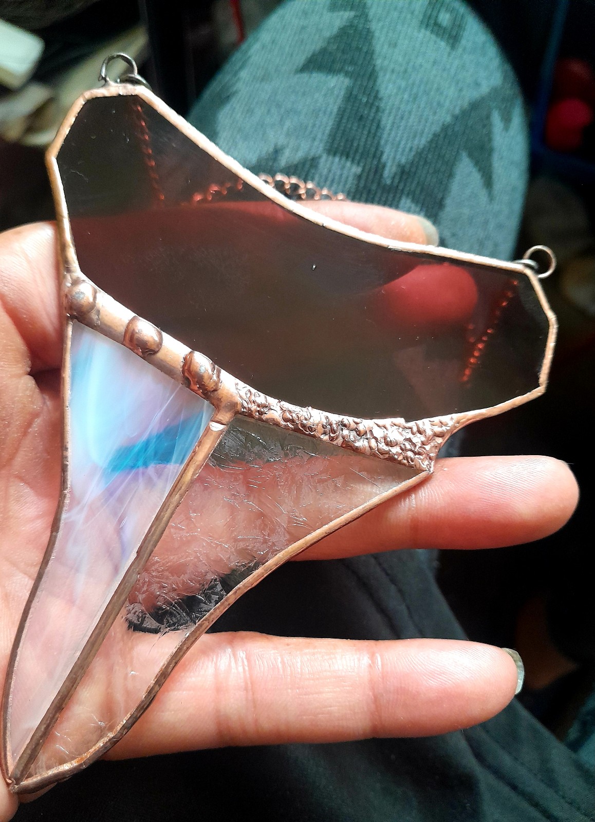 Stained glass maroon shark's tooth suncatcher with copper finish