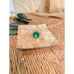 Adjustable gold tone ring with large green stone