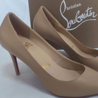 Christian Louboutin flesh-colored high heels