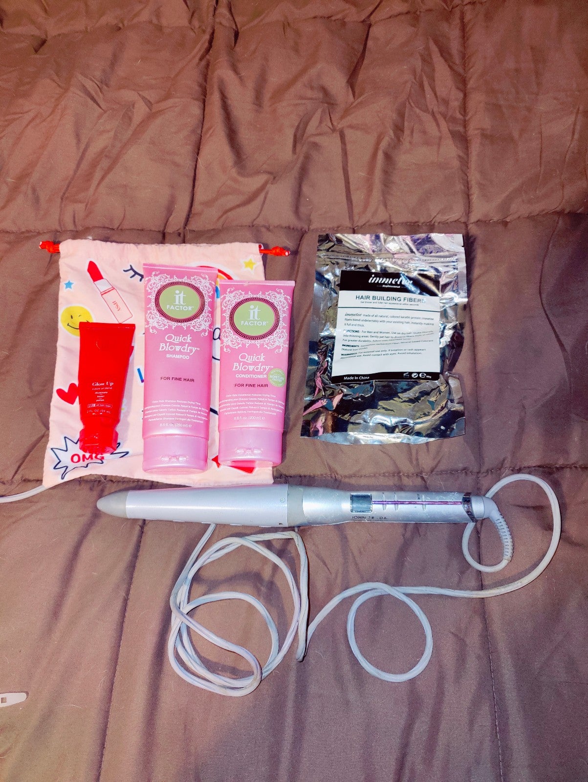 Hair products new .. with John Freida curling wand