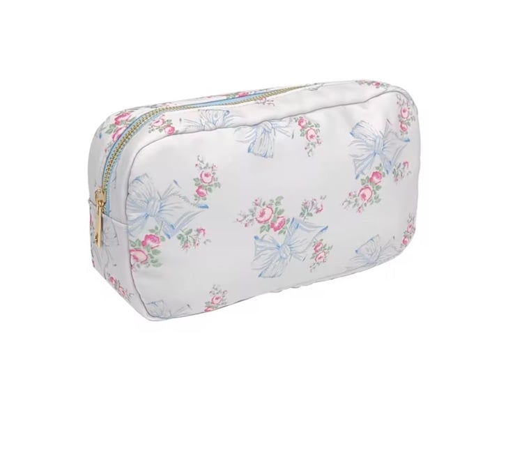 Floral Bow Cosmetic case comes in pink as well and many different sizes