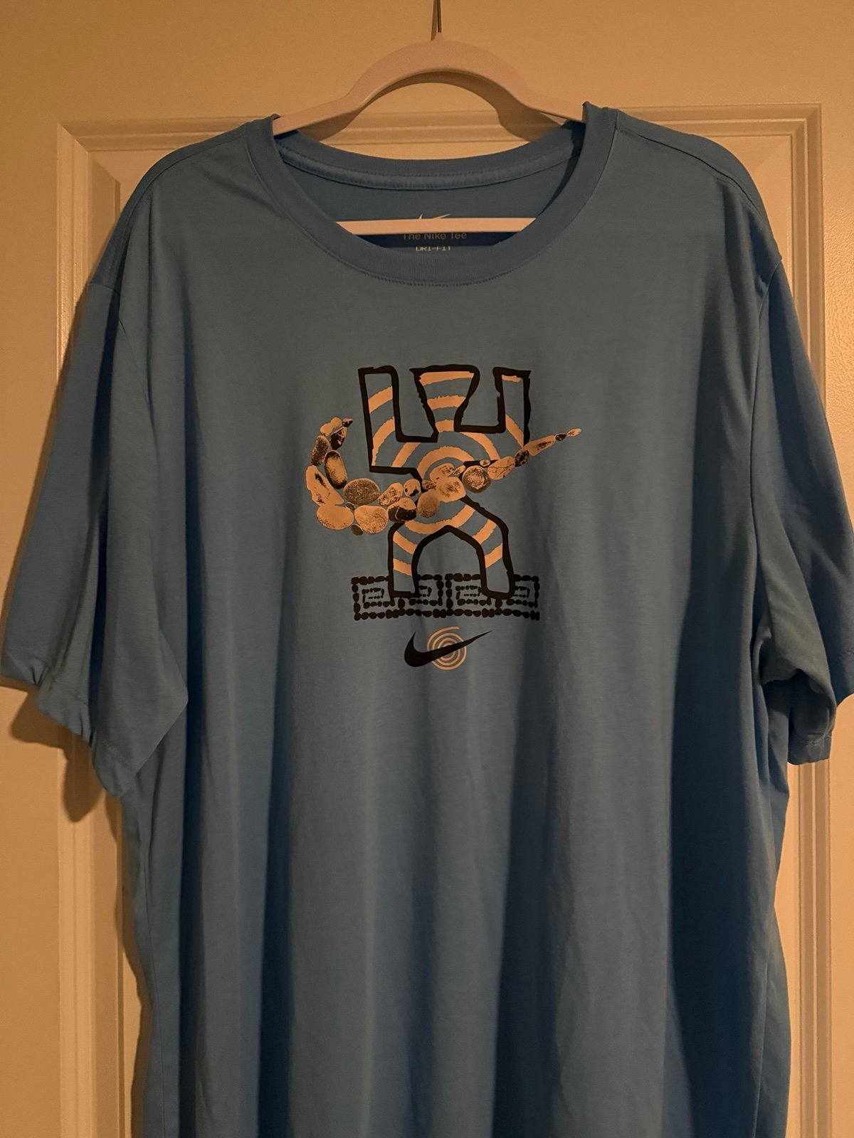 Nike Sportswear Petroglyphs Mind Body Spirit Shirt Blue DR7573-412 Men’s