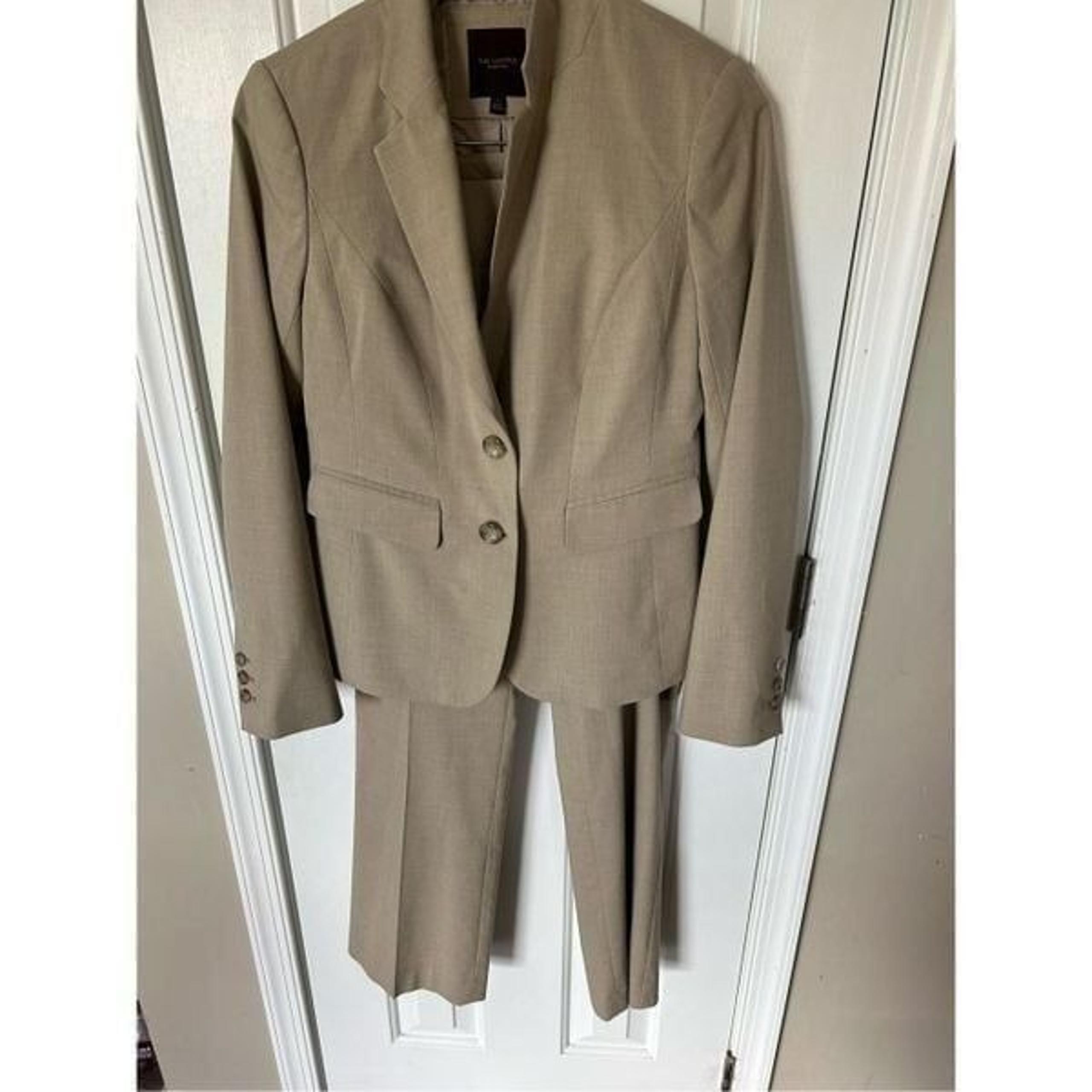 The limited tan suit jacket size 4 and pants size 6