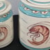 3 piece set of canisters crawfish pattern by De La Mer