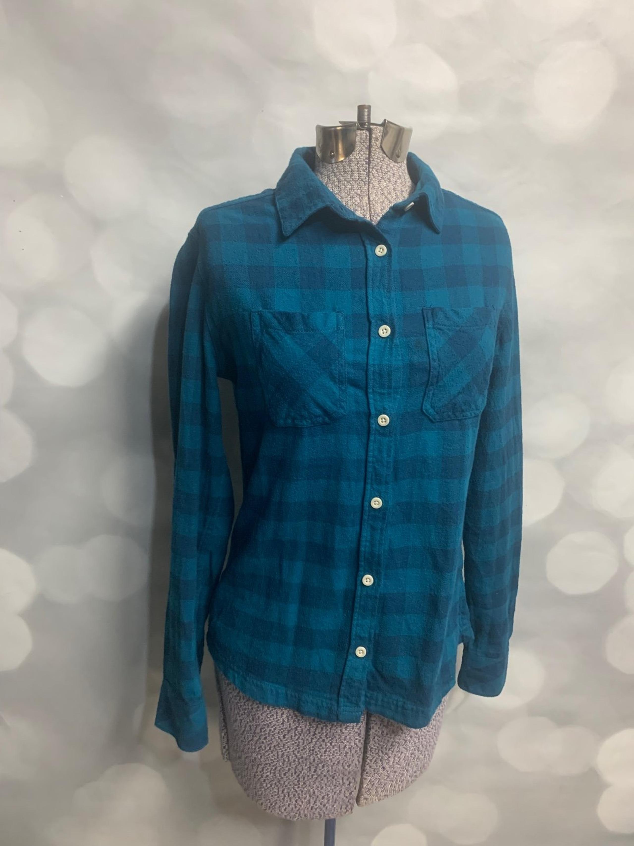 Eastern Mountain Sports button-down plaid top.