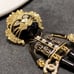 Smart Lion c c brooch