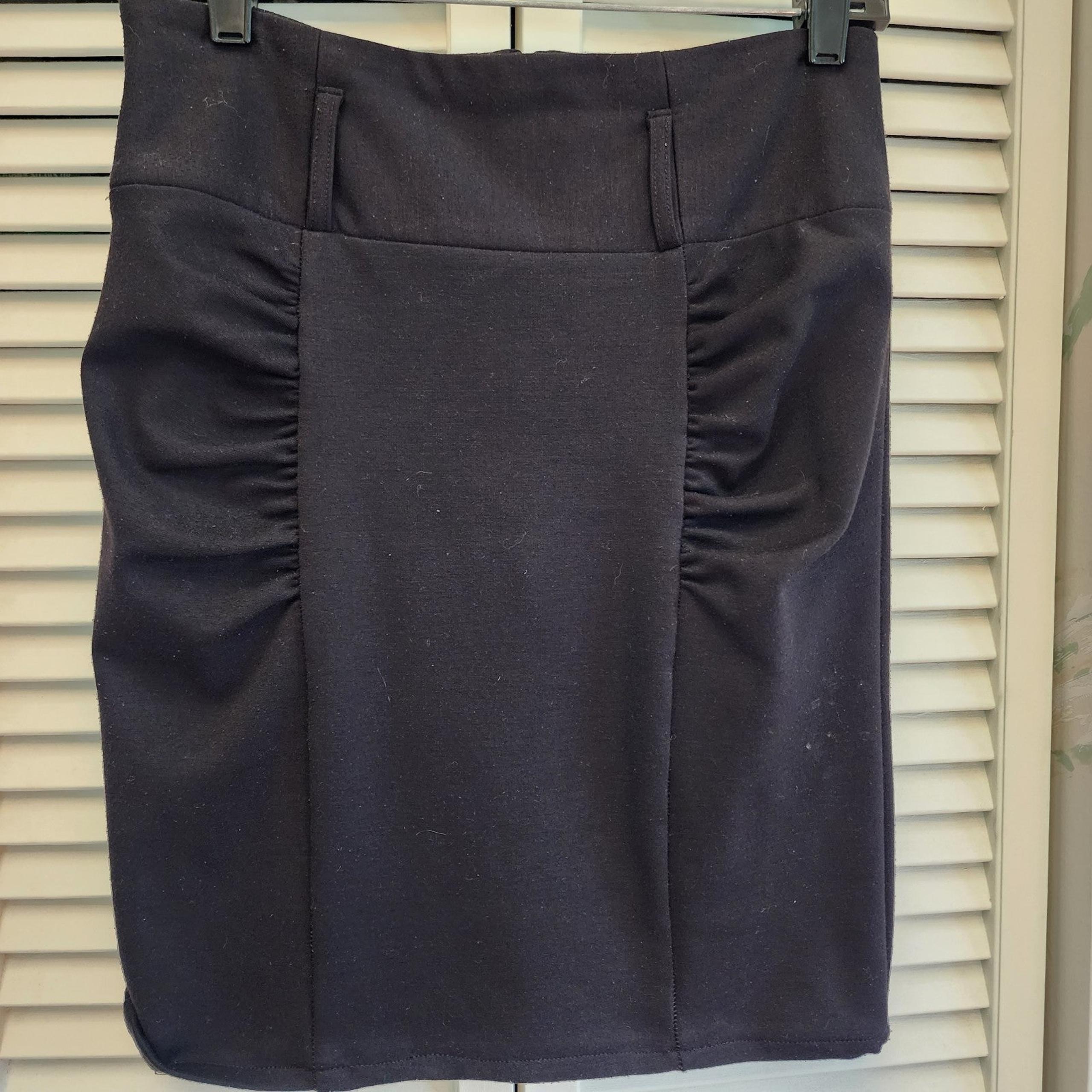 Black skirt. Size 3. BCX. Loop for belt.  Ruched in front.