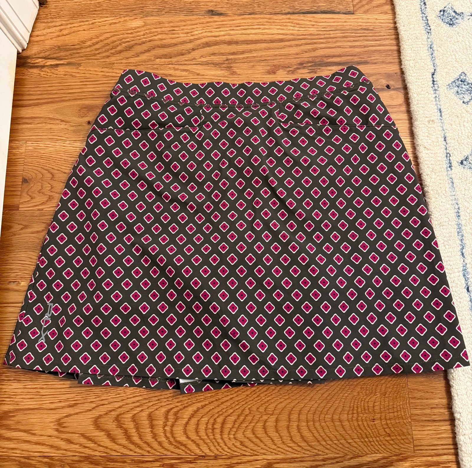 RLX Ralph Lauren Pleated Four Way-Stretch Skort Green and Pink Pattern Small
