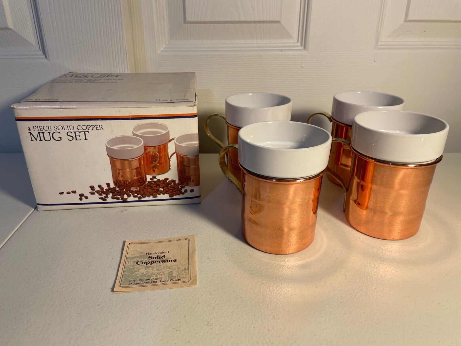 VTG Mug Set Solid Copper Ceramic Inserts Brass Handles 4 Piece IOB NOS w/insert