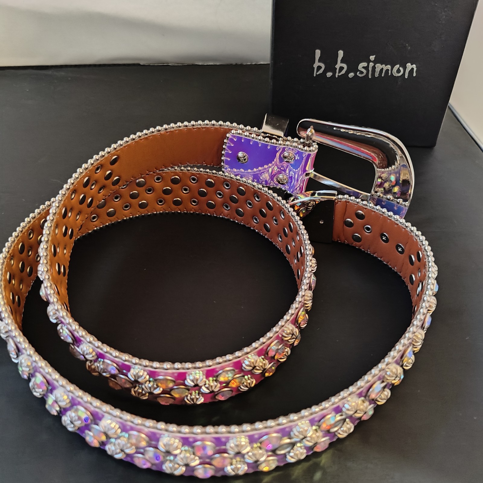 Belt fully covered in gemstones . Excellent quality