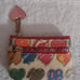 DOONEY & BOURKE VINTAGE RAINBOW HEARTS COIN PURSE