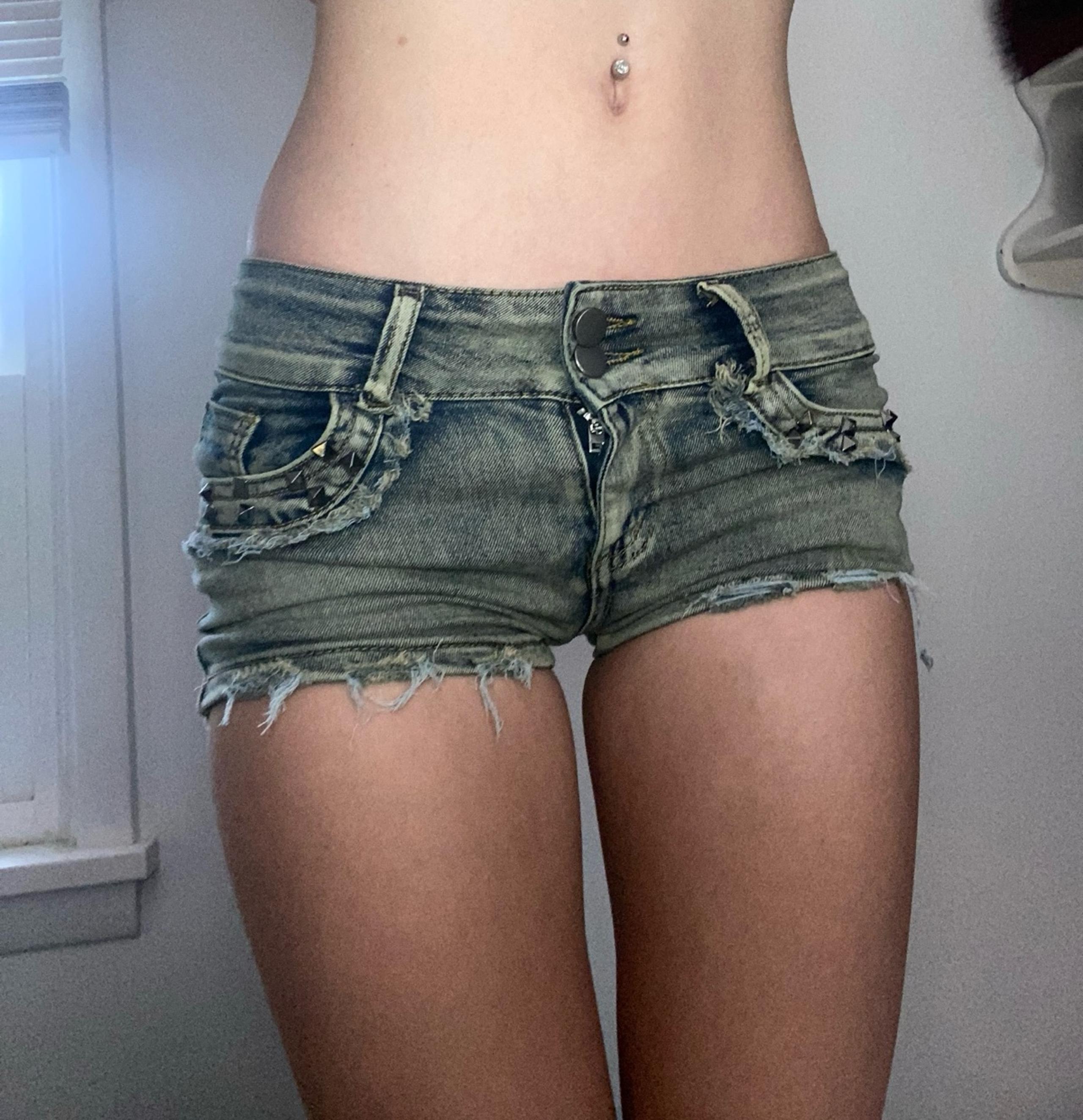 light wash studded low rise jean shorts