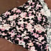 Momper Pleated Nursing & Maternity romper in vibrant tie dye.