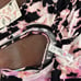Momper Pleated Nursing & Maternity romper in vibrant tie dye.