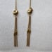 Vintage Monet Tassel Lariat Necklace Goldtone Chain Disc Cap Elongated Bead