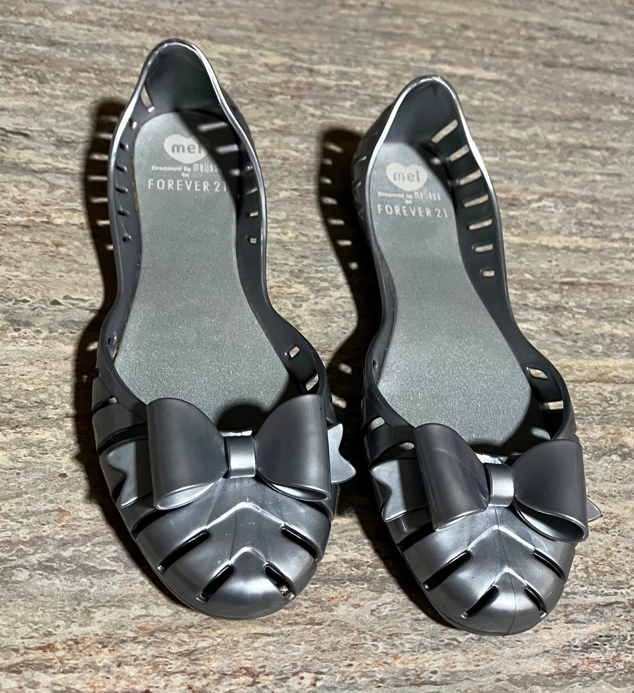 NWOB Mel by Melissa X Forever 21 bow top silver rubber flat shoes