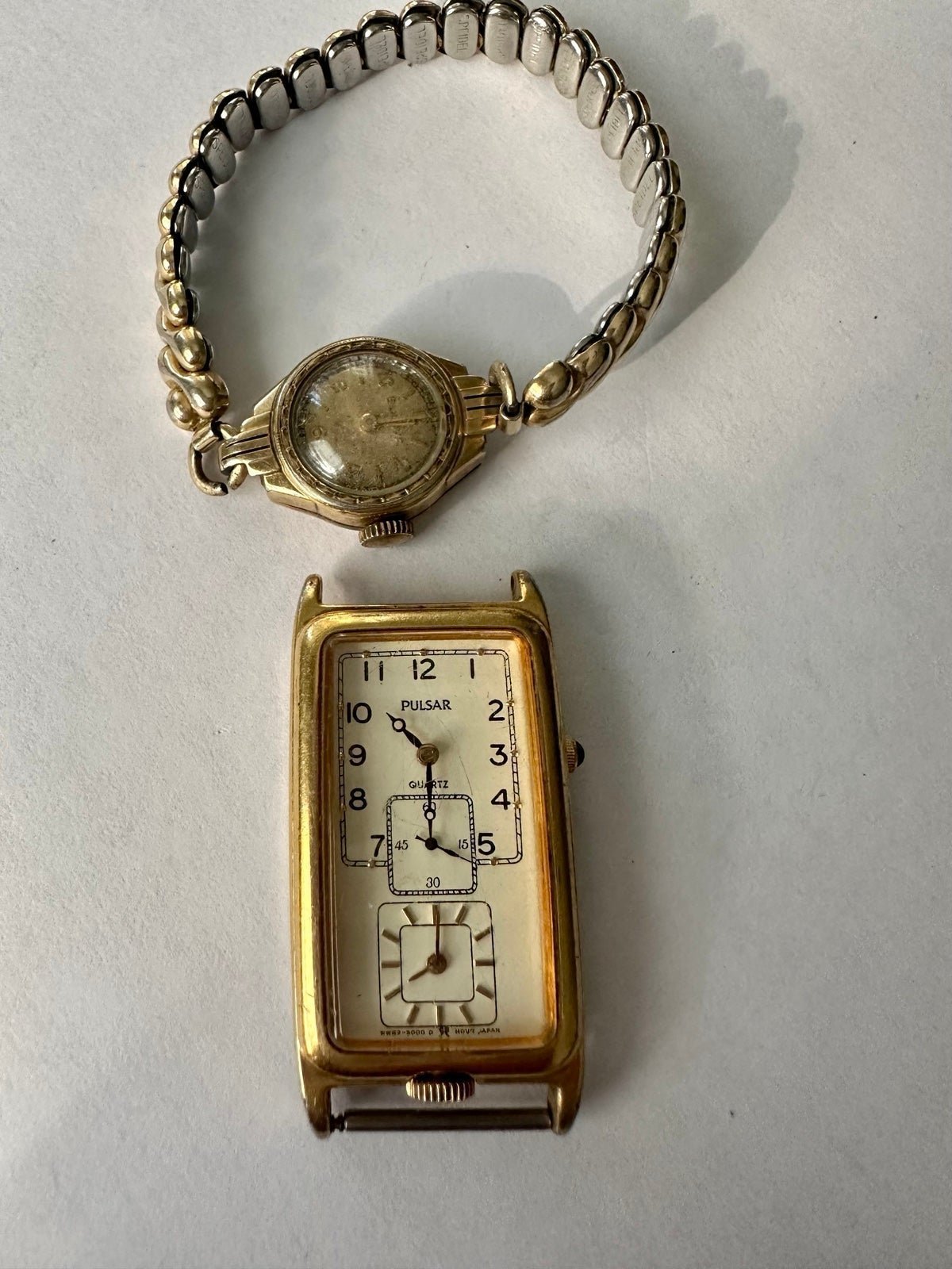 Vintage gold pulsar watch and 10k gold fild bulova watch