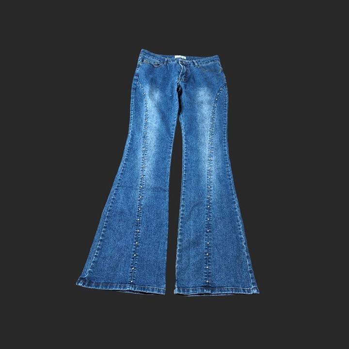 flared faded metal embellished vertical seam pants, large monogram patch in the