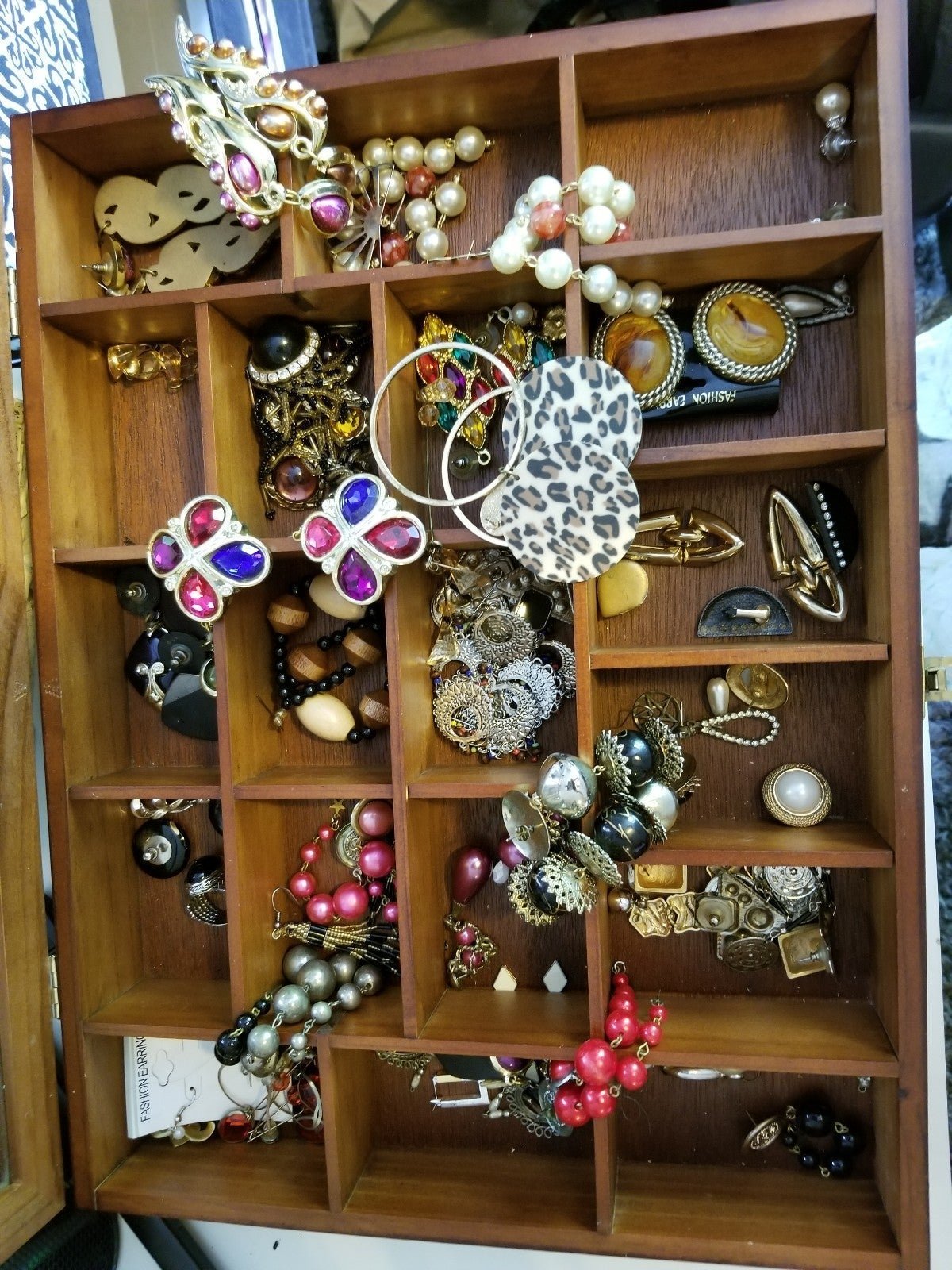 At least 50 pair of earrings