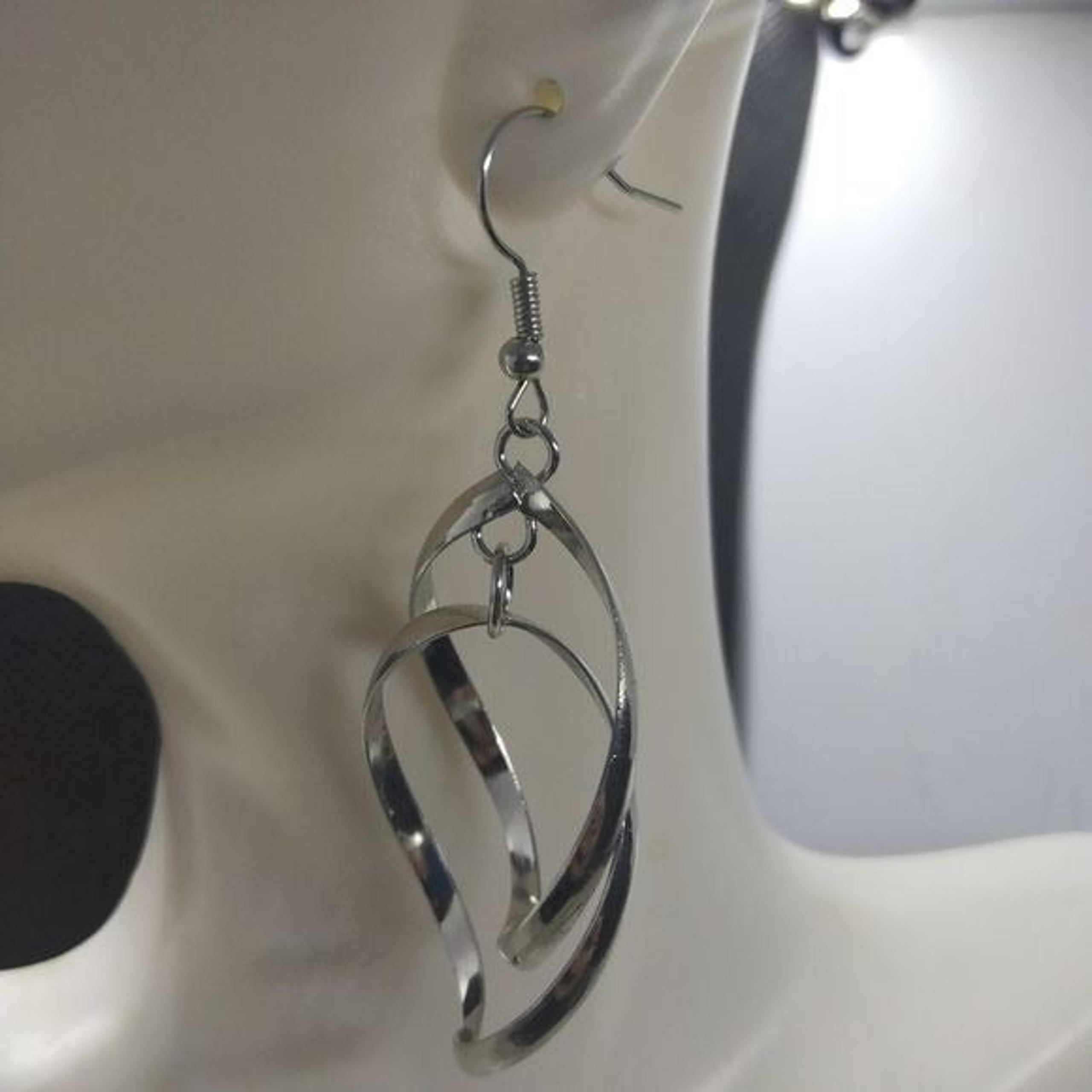 Double swirl silver earrings