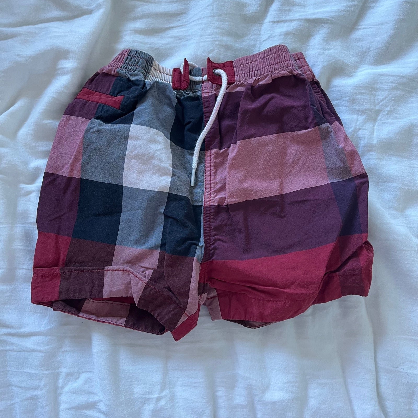 Great condition Burberry red check swim trunks size 9 months