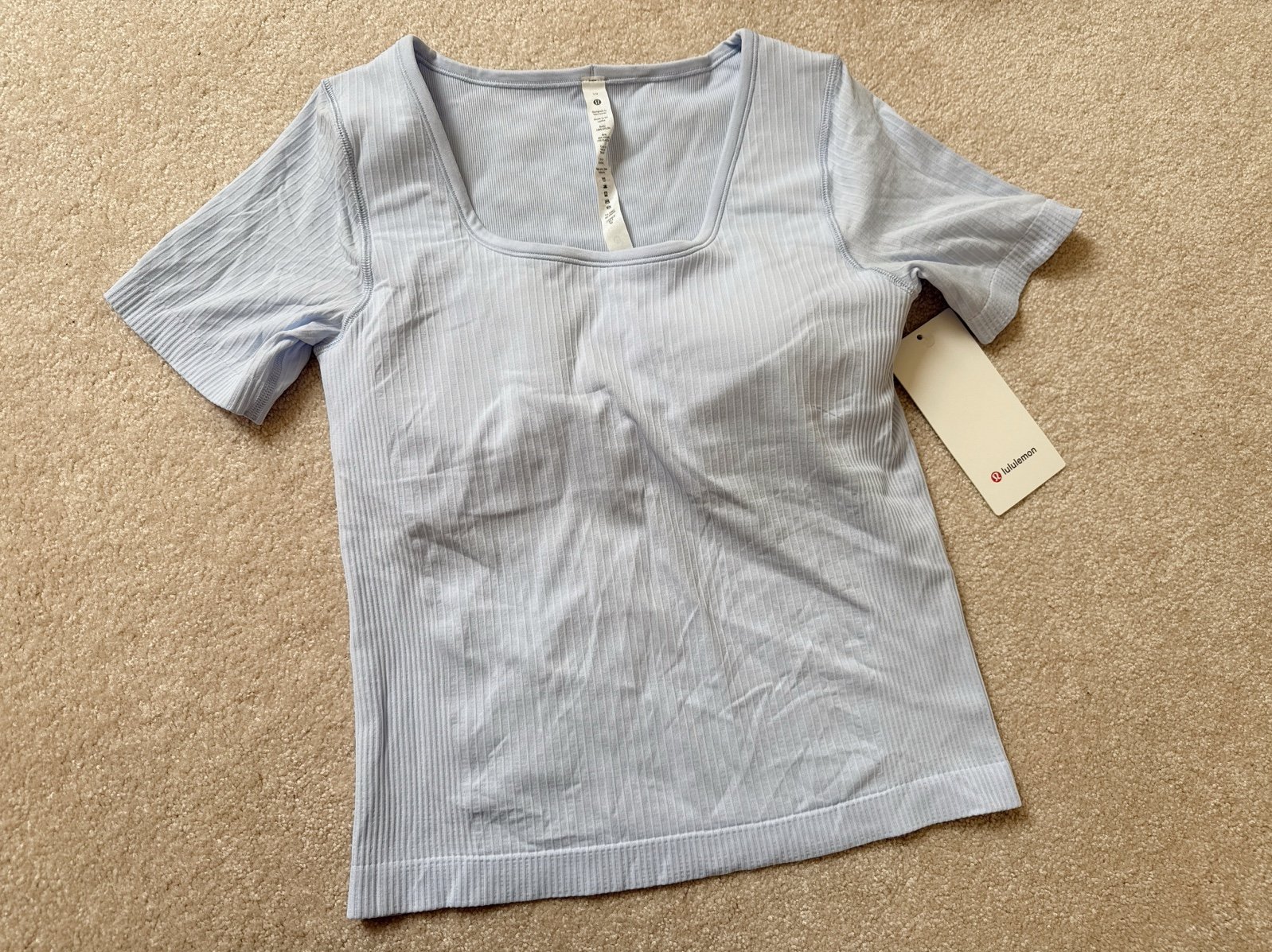 New with Tag Lululemon Ebb to street short sleeve PSLB SIZE 10