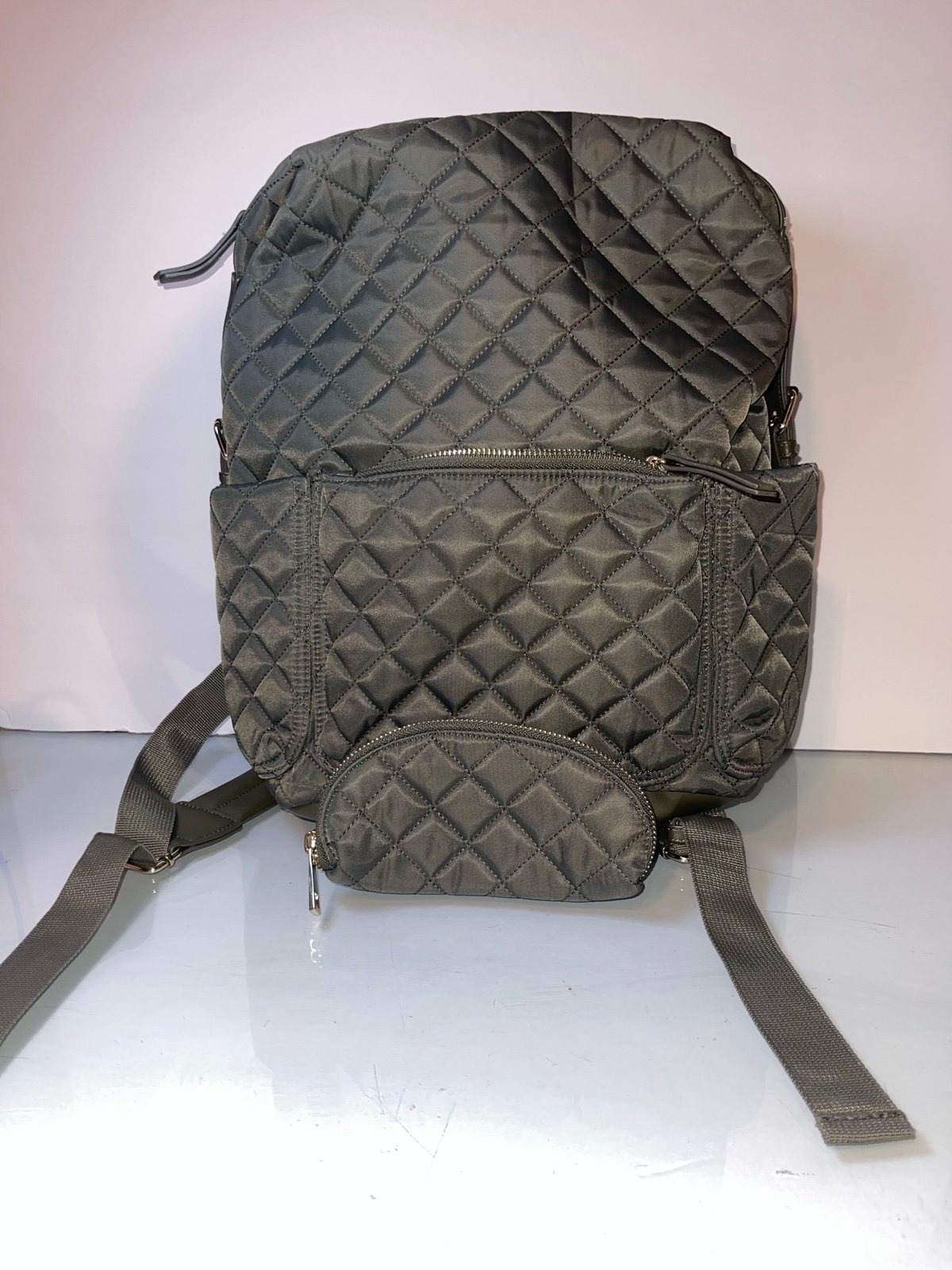 tommy bahama quilted back pack