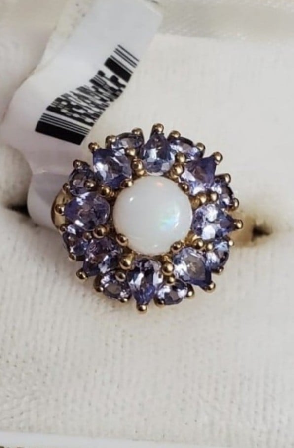 New. 10k Australian opal & tanzanite ring size 7. Stamped 10k. New with tags. Gr