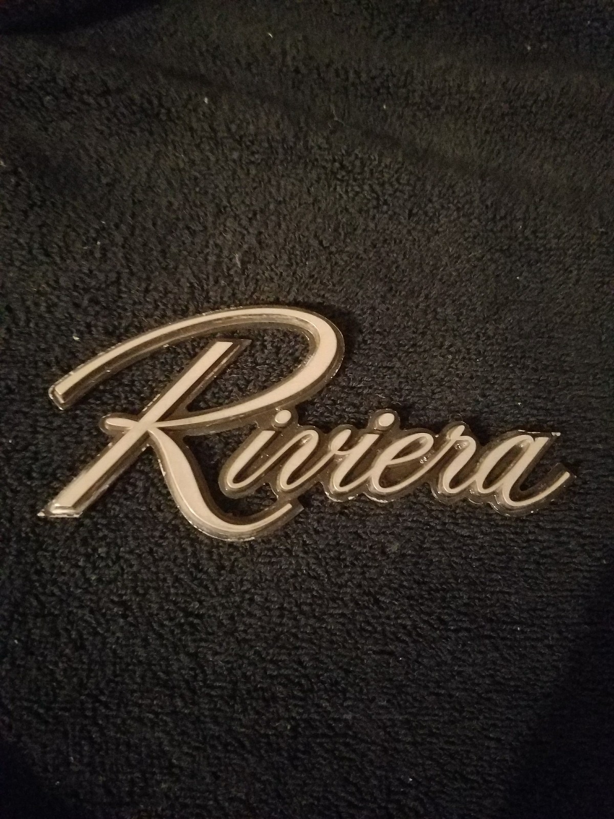 Riviera car emblem