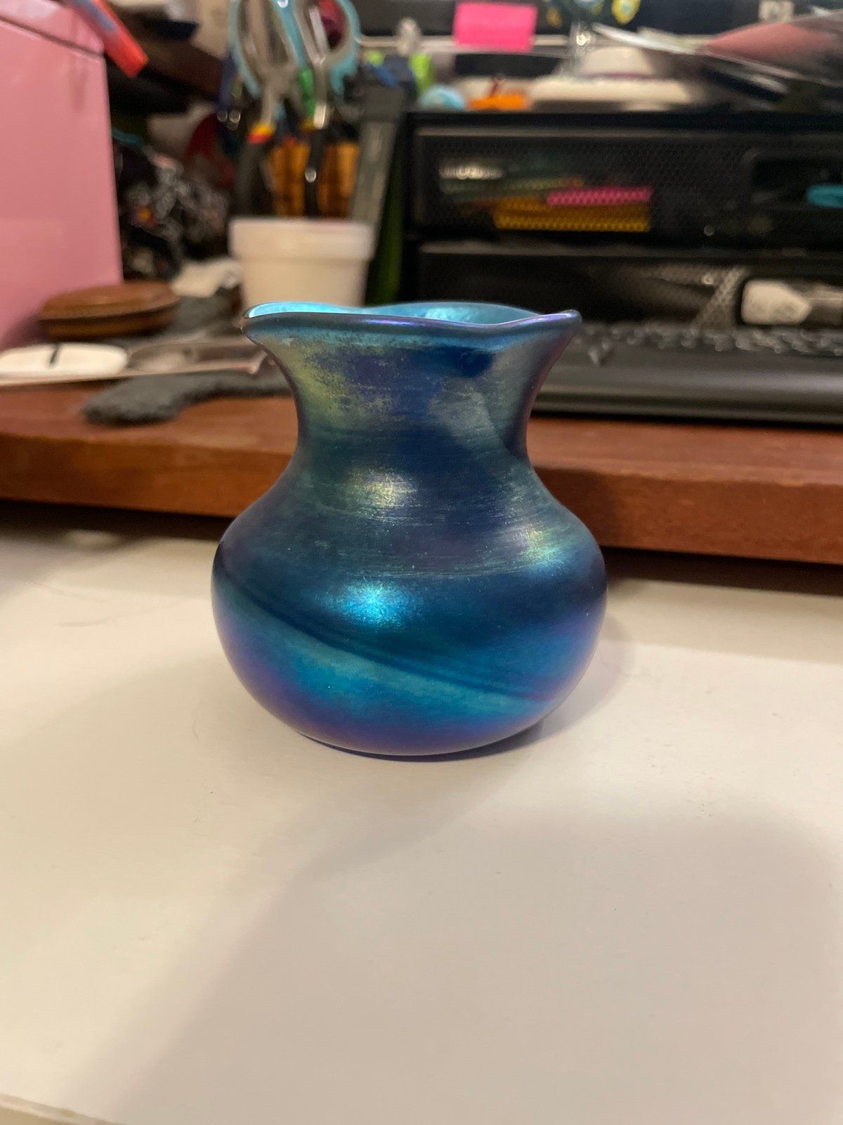 Iridescent blue glass vase