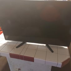 32 inch flat screen TV and roku ultra 4k combo