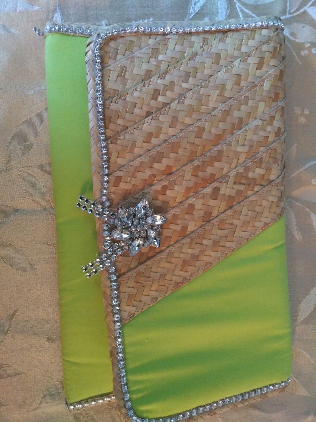 Lime green fabric and straw clutch with