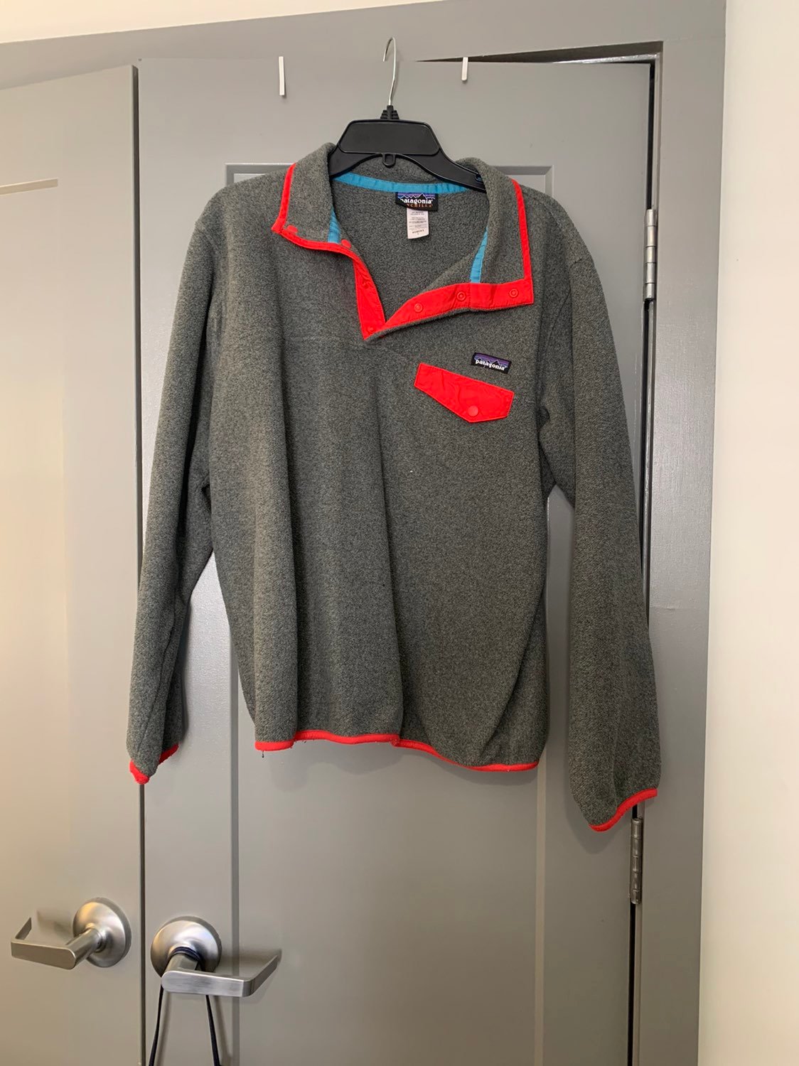 Patagonia grey and red long sleeve fleece jacket