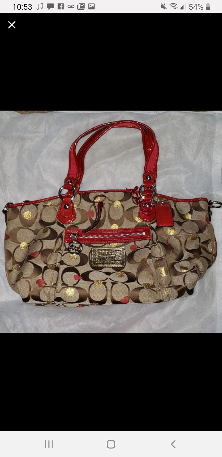 Coach red and gold purse.